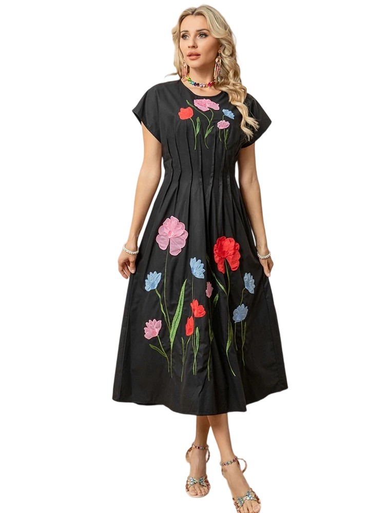 A retro embroidered midi dress with breezy A-line skirt
