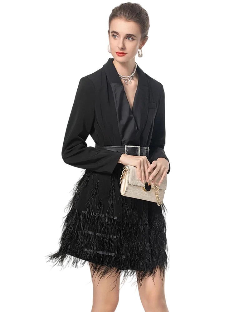 A feather-trimmed street chic slim overcoat.