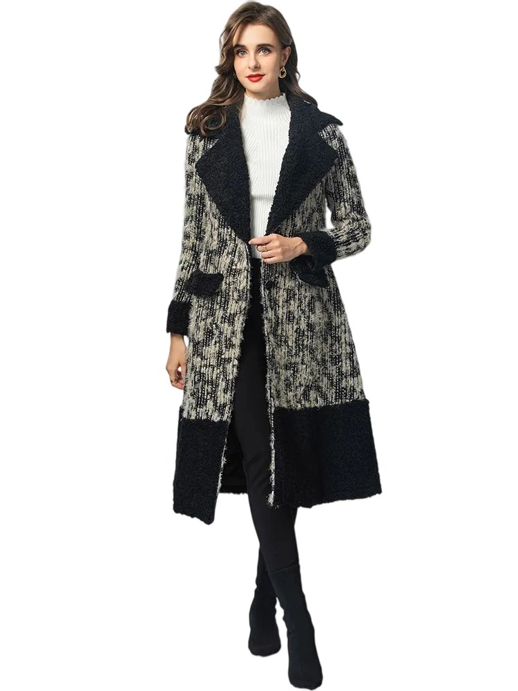 A vintage lace-up coat with notched lapel and tunic length