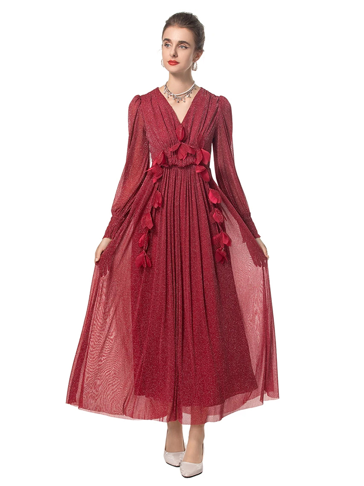 A pleated lantern sleeve dress with eclectic patchwork